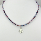 Pendentif Fleur de lys sur collier Liberty 