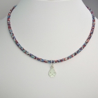 Pendentif Coccinelle sur collier Liberty 